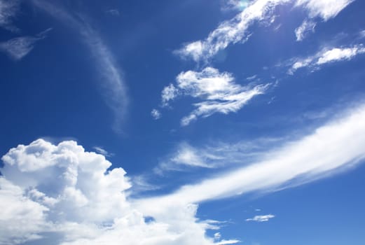 Natural Blue Sky Background With White Clouds.