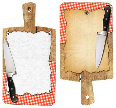 Two notebooks for recipes or menu on used wooden cutting boards with kitchen knife and red checked tablecloth
