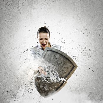 Image of businesswoman crashing with arm shield