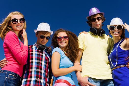 Group of young and happy people having party