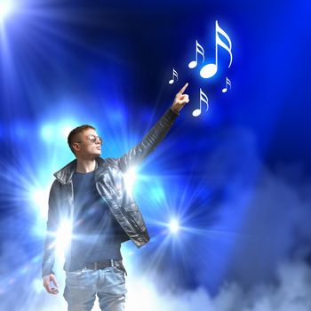 Image of young man rock musician in lights