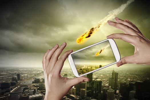 People taking photos of falling meteorite on mobile phone camera