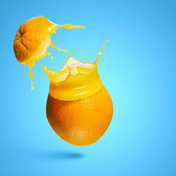 Image of refreshing orange cocktail with juicy splashes