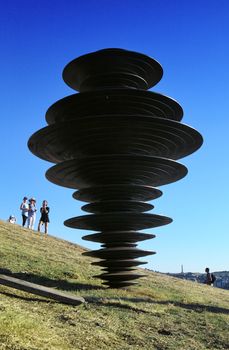 Bondi Beach, Australia - November 3,  2013: Sculpture By The Sea, Bondi 2013. Annual cultural event that showcases emerging artists from around the world  Sculpture titled Multiverse 2012' by Ewen Coates (VIC).  Medium fibreglass, resin, steel.  Price $39900