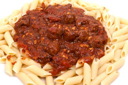 meatballs in tomato sauce with penne pasta.