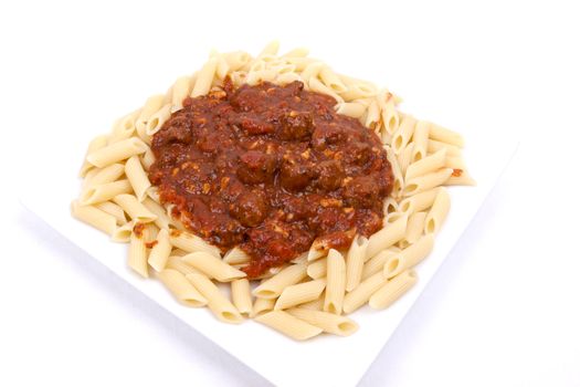 meatballs in tomato sauce with penne pasta.