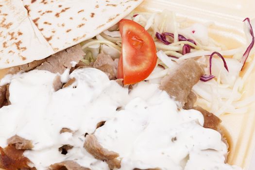 Take away doner kebab isolated on white