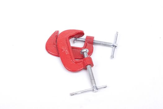 Red clamps isolated  on a white background