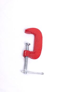 Red clamp isolated on a white background