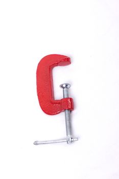 Red clamp isolated on a white background