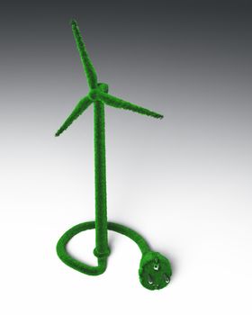 a grassy wind generator connected from its base to a grassy cable and plug, on a white and gray background