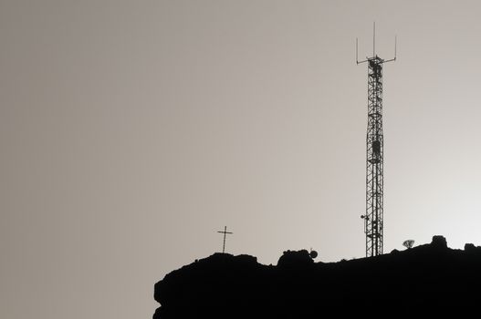 Some Silhouetted Antennas on the top of a Hill