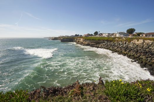 View of the California coast to the north of Santa Cruz with houses in the distance