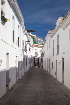 Typical white houses in  the narrow street of Mijas - Andalusia, Spain