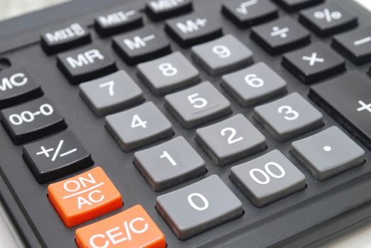 Closeup of Black Calculator Keypad with Grey Buttons