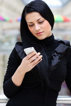 young beautiful woman calling by phone