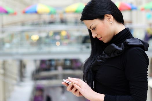young beautiful woman calling by phone
