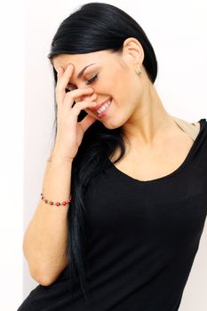 Closeup portrait of a happy young woman smiling