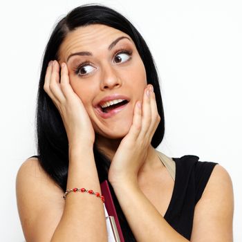 Young woman with weird expression isolated on white