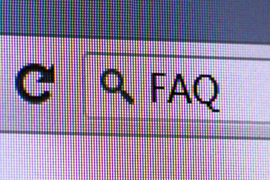 Close up macro of internet browser with FAQ text on address bar.