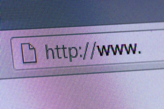 Close up of computer screen internet browser address bar with blank web url.