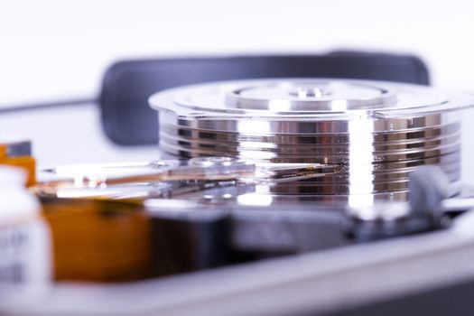 Close up of opened hard disk drive.