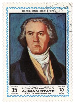 AJMAN - CIRCA 1972: A stamp printed in Ajman shows a portrait of German composer Ludwig van Beethoven in 1823, series, circa 1972