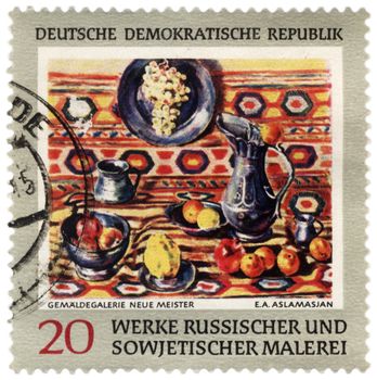 GDR - CIRCA 1960s: A stamp printed in GDR (East Germany) shows picture (still life) of a Soviet artist Aslamasyan, circa 1960s