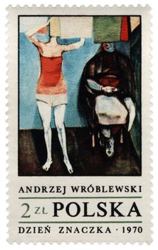 POLAND - CIRCA 1970: a stamp printed in Poland, shows picture of polish painter Andrzej Wroblewski (1927-1957) - Woman hang clothes after washing, circa 1970