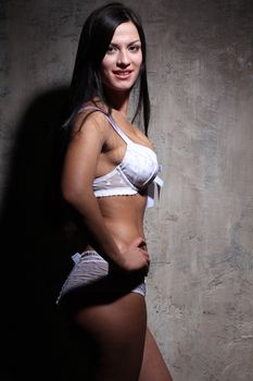 Sexy bikini model - wall studio