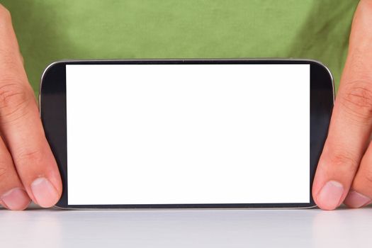 Hand holding and showing smart phone with blank, white screen, front view, isolated on white background.