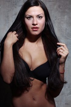 Sexy young woman, body on young female in soft light