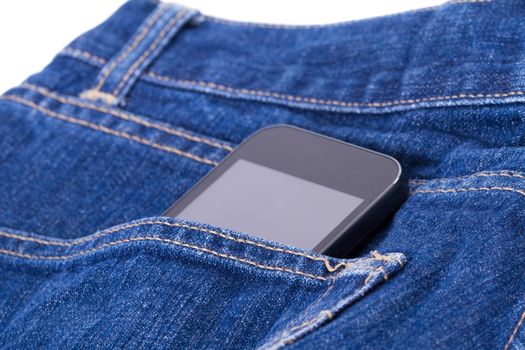 Smart phone in the pocket of blue pants.