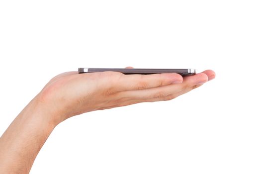 Hand holding and showing smart phone with blank screen, side view, isolated on white background.