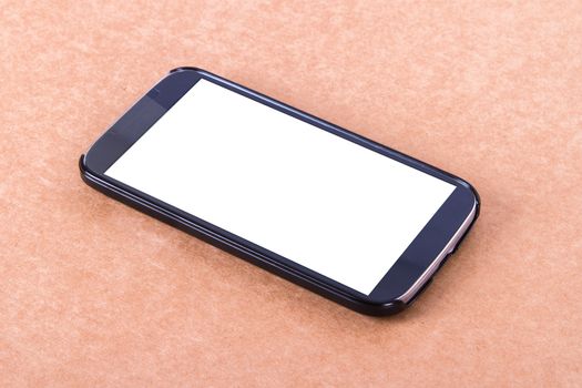 Smart phone with blank, white screen on wooden background.