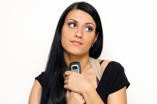 Young beautiful woman talking on cell phone