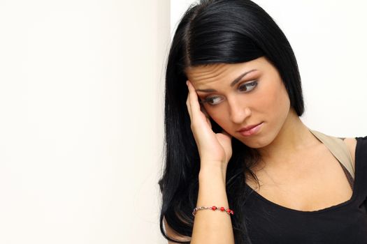 Closeup portrait of young woman looking depressed