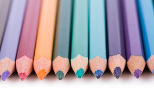 Colored pencils, isolated on white background.