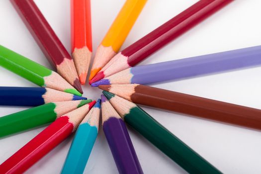 Colorful pencils with round shape, isolated on white background.