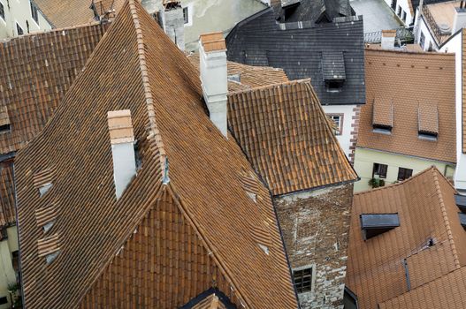 Detail of orange roof shingles at old european town.
