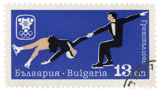BULGARIA - CIRCA 1968: A post stamp printed in Bulgaria shows pairs figure skating, dedicated to Winter Olympic games in Grenoble, series, circa 1968