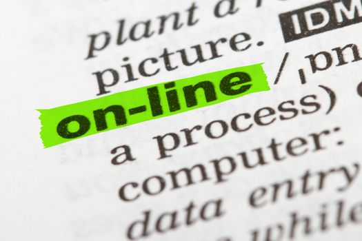 On-line word highlighted with green marker on dictionary page.