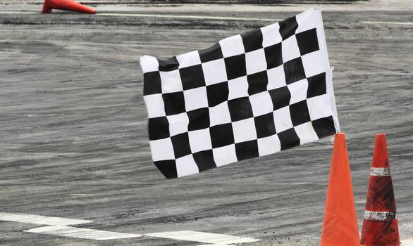 Finish flag on track in racing car