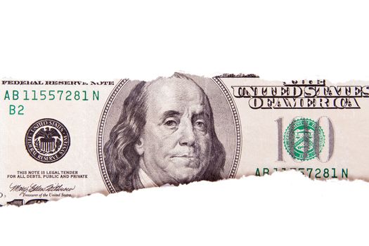 One hundred dollar bill with teared white papers, isolated on white background.