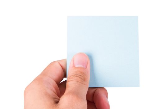 Hand holding blank, empty, blue sticky post it note with copy space, isolated on white background.