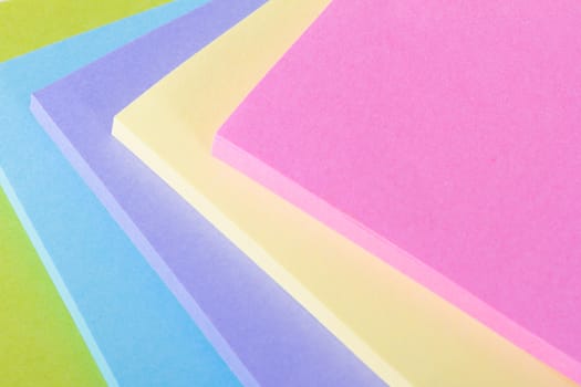 Multi colored sticky post it notes.