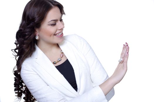 Portrait of attractive brunette looks at the ring