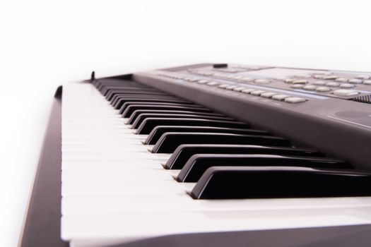 Black and white piano keys, isolated on white background.