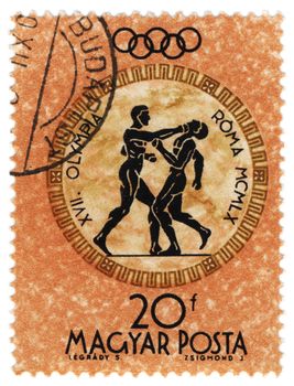 HUNGARY - CIRCA 1960: A post stamp printed in Hungary shows boxing, devoted to the Olympic games in Rome, series, circa 1960
