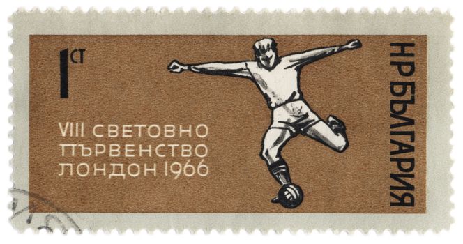 BULGARIA - CIRCA 1966: A stamp printed in Bulgaria shows football player kicks the ball, dedicated to the World Cup in London in 1966, circa 1966